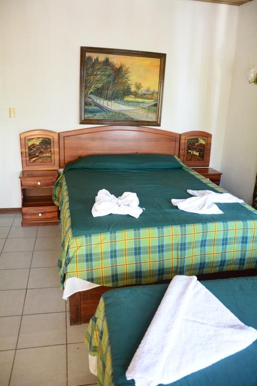 Hotel Sherwood Tela Oda fotoğraf